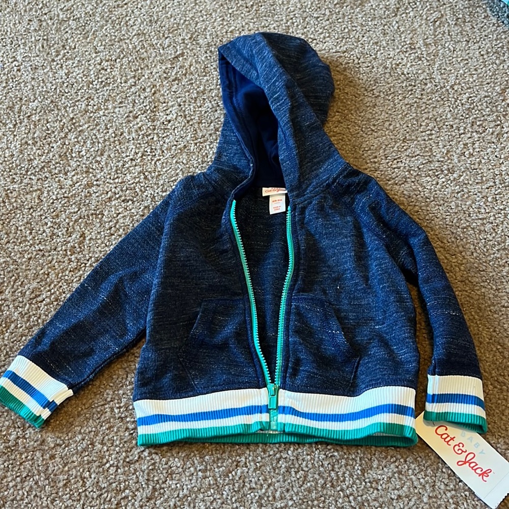 BNWT.  Cat & Jack fleece zip up hoodie.  6-9 month.